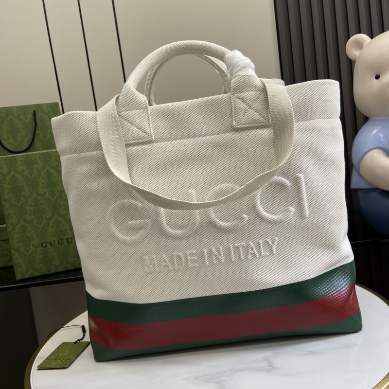 G*u*i shopping bags